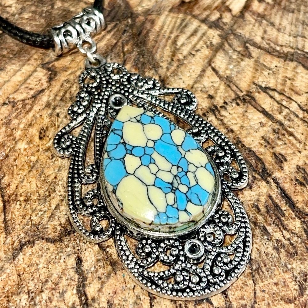 Beautiful Blue & Yellow Rainbow Calsilica Pendant 2 1/2”